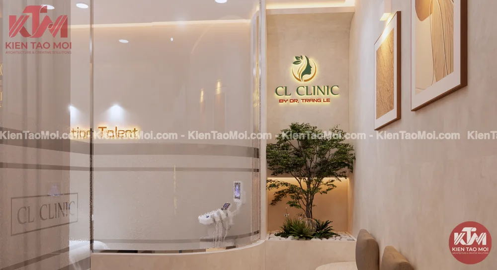 Bồn cây xanh và logo phát sáng nội thất phòng khám da liễu Bồn cây xanh nội thất phòng khám da liễu dưới logo phát sáng