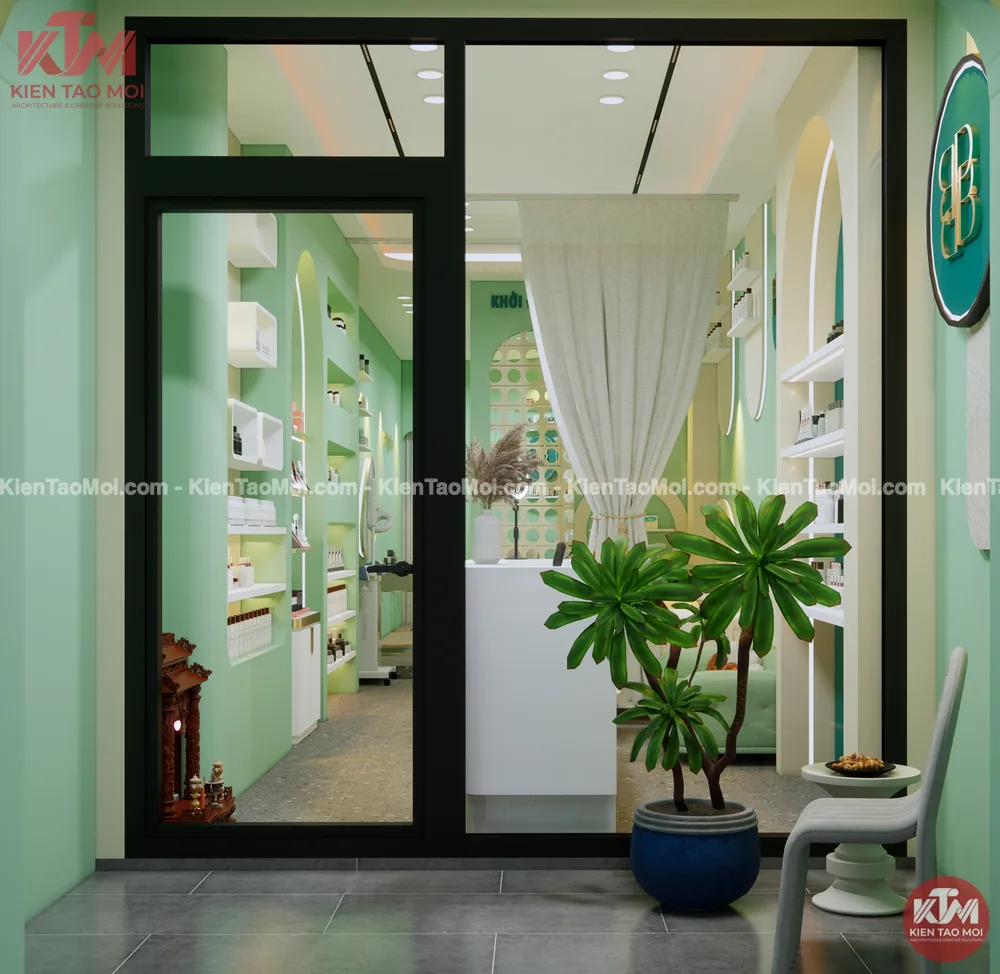 Cửa kính lối vào spa với chậu cây xanh và ghế chờ trắng