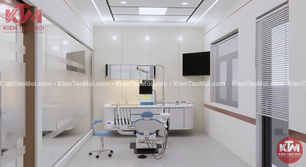 Ghế điều trị tông trắng xanh nội thất nha khoa, tủ dụng cụ bo tròn phía sau