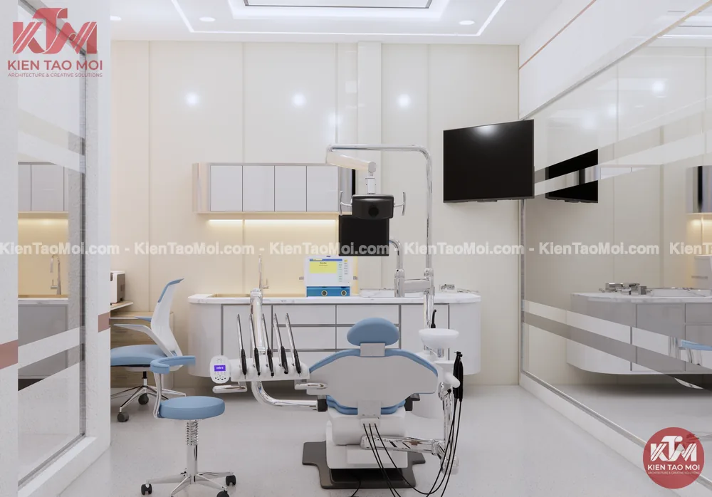 Ghế điều trị xanh nội thất nha khoa giữa phòng khám 01, vách kính mờ