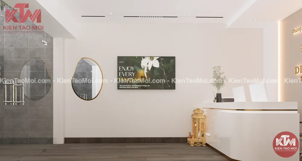 Gương viền đồng và tranh nội thất phòng khám da liễu tại sảnh