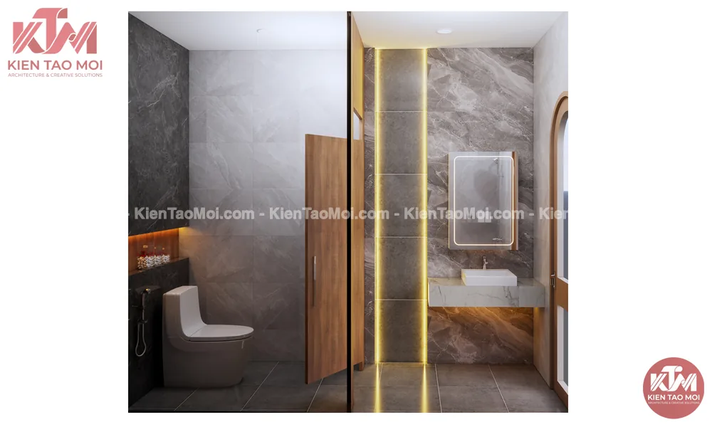 Lavabo đá và vách ngăn gỗ trong WC, khe đèn vàng dọc tường