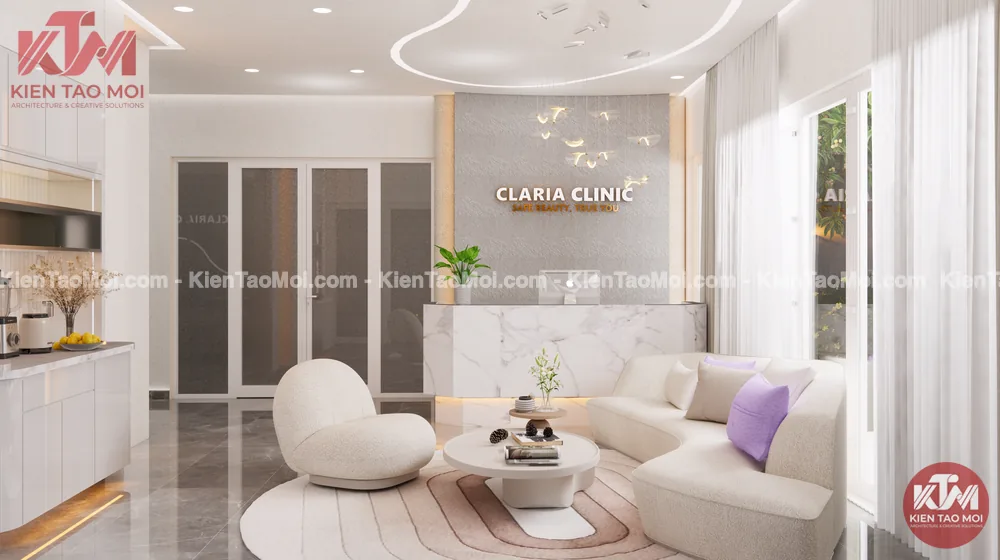 Sảnh chờ nội thất phòng khám da liễu sofa cong êm ái Sảnh chờ nội thất phòng khám da liễu, sofa cong kem gối tím