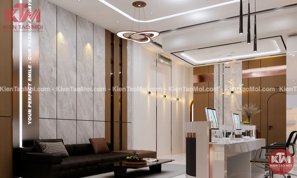 Khu tư vấn nội thất nha khoa với sofa da đen và bàn tư vấn