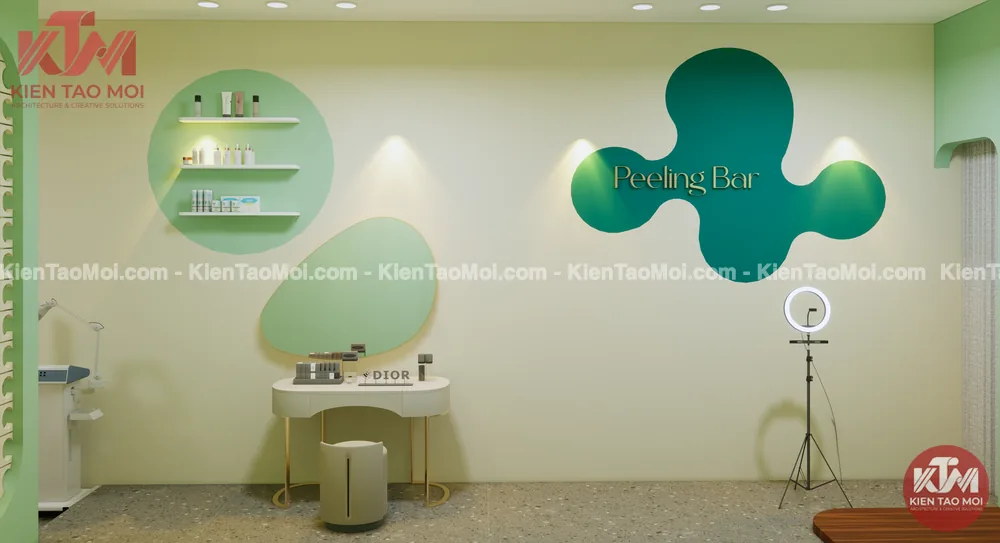 Tường logo xanh lượn sóng và bàn trang điểm chân đồng